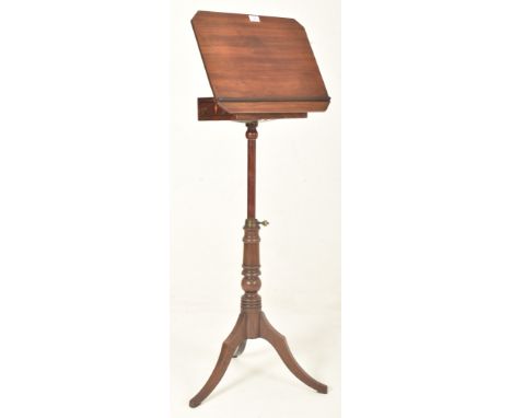 A Victorian 19th century mahogany articulated top pedestal reading / lectern music stand. The stand having a rectangular tilt