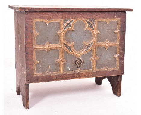 Manner of Pugin - A Gothic late 19th century carved oak painted ecclesiastical decorated coffer. The chest having a hinged to