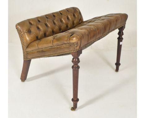 A 19th century leather Chesterfield buttoned foot stool. The stool of mahogany construction with button backed chesterfield l