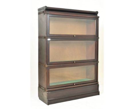 An early 20th century Globe Wernicke inspired oak &amp; glazed front three-tier lawyer barristers bookcase / library stacking