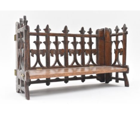 Manner of Pugin - A Victorian 19th century carved ecclesiastical oak folding book trough shelf. The trough having a Gothic st