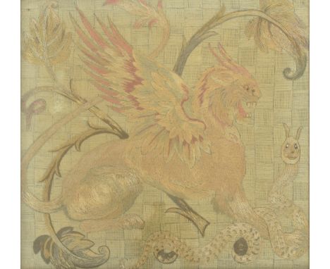 A late 19th / early 20th century tapestry depicting a winged griffin slaying a snake. With bead detail to the eyes. Hand sewn