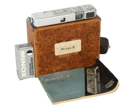 A Minox B Spy camera, original green leather case and chain, instructions and boxed film