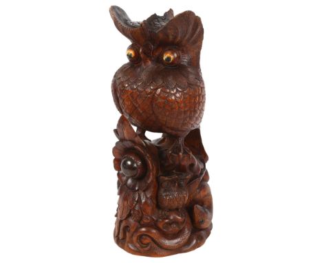 A Vintage African carved wood group of owls and a snake, H41.5cm, signed