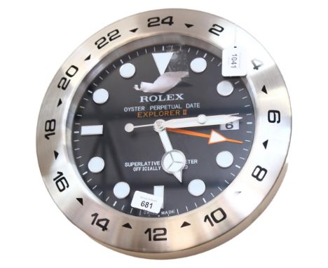A reproduction quartz wall clock, 34cm