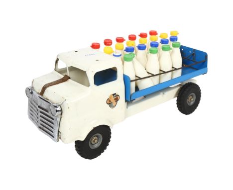 A Vintage Tri-ang milk lorry, with associated milk bottles, 4 of the 28 milk bottles are missing