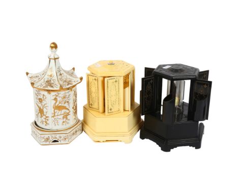 2 Vintage musical cigarette dispensers, and a ceramic musical cannister (3)