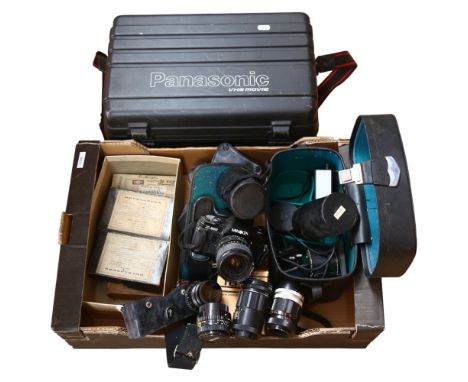 A Vintage Minolta X-300 camera, various lenses, and a Sanyo camcorder (boxful)