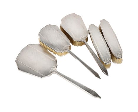 DAVIS, MOSS &amp; COMPANY - an early 20th century engine turned silver-backed 5-piece dressing table brush and mirror set