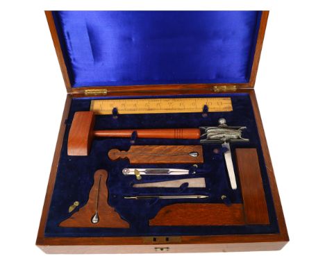A cased set of working tools, reportedly from a Masonic Lodge circa 1929, case width 42cm