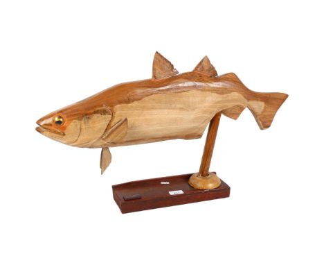 A carved wood Pollock on wooden stand, by Clive Fredriksson, dated 2023, L71cm