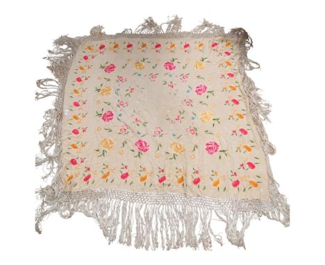 A silk hand-stitched shawl, with floral decoration and frilled outer edge, 125 x 115cm