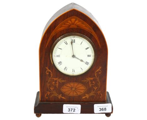 An inlaid mahogany clock with curved top and French 8-day movement, H24cm