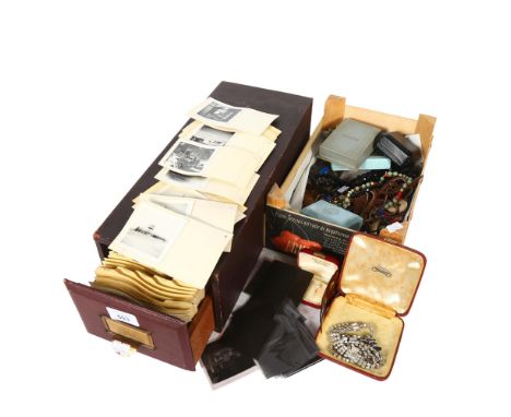 A filing drawer with cards, playing cards, costume jewellery, hair comb etc