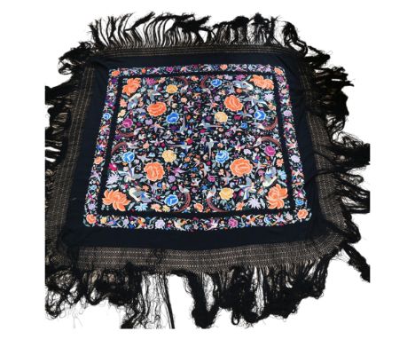 A hand-sewn silk shawl, with floral and ornithological decoration with frilled outer edge, approx 160 x 150cm