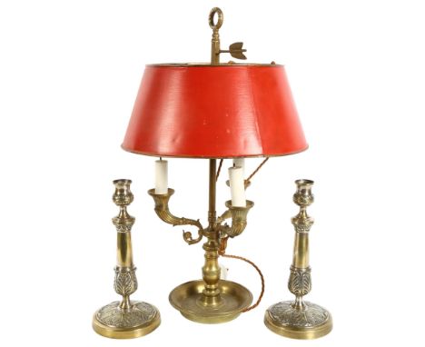 A pair of embossed brass candlesticks, 26.5cm, and a Regency style 3-branch brass table lamp and shade