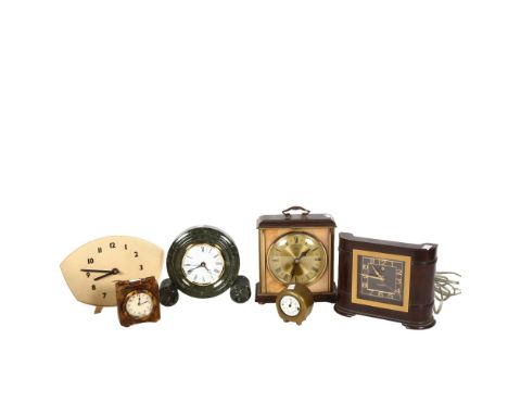 A German quartz clock in polished stone frame, travel clocks, Genalex Bakelite electric clock, and 2 others