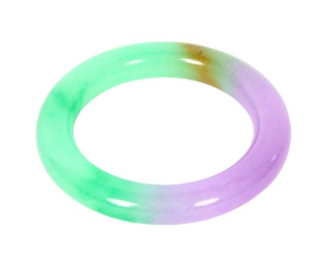 A two-colour jadeite bangle, diameter 8.5cm, internal diameter 6cm