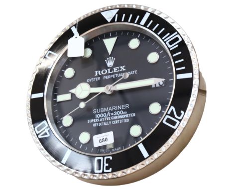 A reproduction quartz wall clock, 34cm