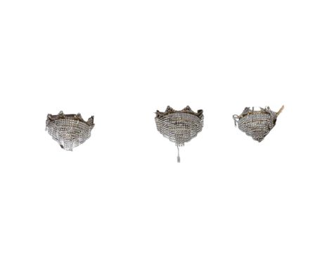 A pair of gilt-metal 4-tier light fittings with lustre drops, diameter 38cm, drop 33cm, and a matching smaller 3-tier light f