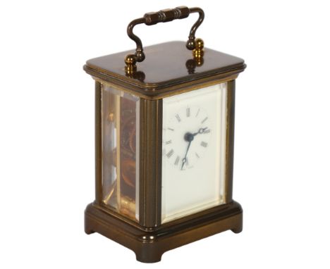 A miniature brass-cased carriage clock, back of the movement engraved N Norman London 1742, height not including handle 6cm, 