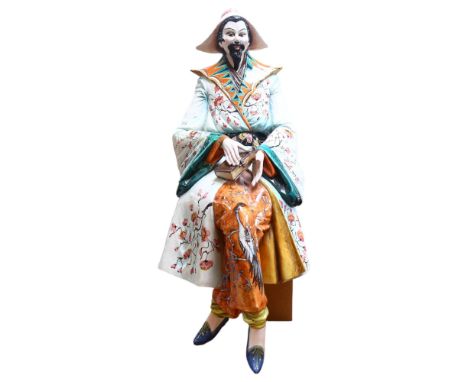 An Italian ceramic study of a seated Chinese gentleman, hand painted floral and peacock decoration, H96cm Good vibrant colour
