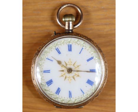A vintage lady’s fob watch with blue roman numerals to the white enamel dial, &amp; in an engraved 15ct gold case.