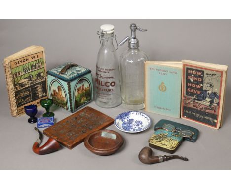 A “T. Denniford &amp; Son” of Plymouth clear glass soda syphon bottle; a vintage marzipan No. 3 mould; a pair of vintage spec