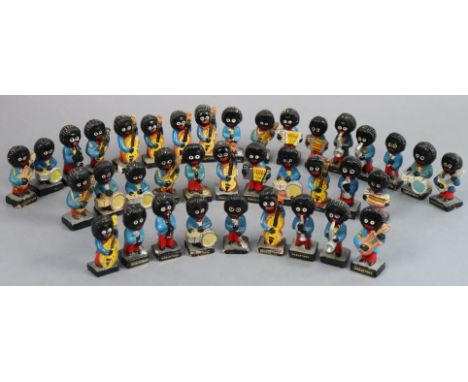 Forty-two Robertson’s Golly bandsmen figures, part w.a.f. Notice from the the-saleroom.com: These items are listed on the bas