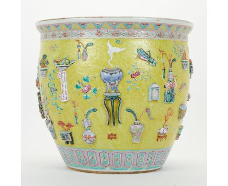 Large Chinese porcelain fish bowl or planter. Profusely decorated along the exterior with applied decoration depicting object