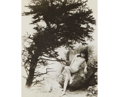 Chin San Long (Lang Jingshan) (Chinese, 1892-1995). Photograph depicting a nude woman reclining against a boulder in a wooded