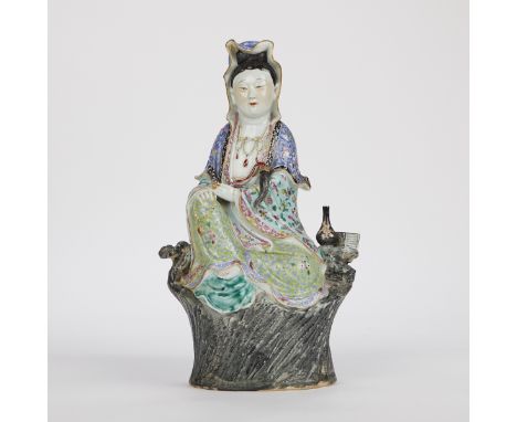 Early 20th century Chinese polychrome porcelain figural sculpture of a lady in robes. The robes are rendered with intricately