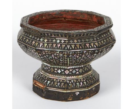 Thai ten-sided offering vessel. Lacquered wood; red along the interior, and black inlaid with small intricate mother-of-pearl