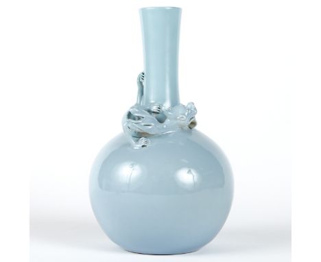 Chinese porcelain clair-de-lune bottle vase, with a dragon in high relief wrapping around the shoulder. The vase has been dri