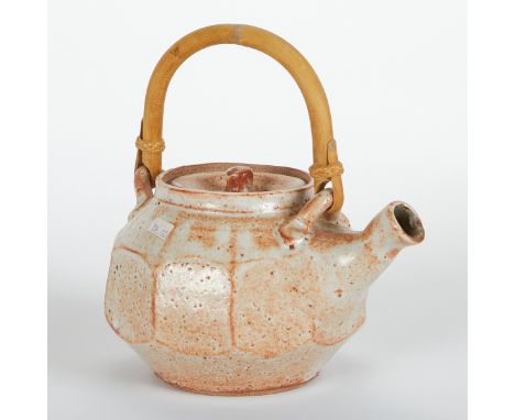 Warren Mackenzie (American, 1924-2018). Studio pottery teapot with bamboo handle. Stoneware with speckled white glaze. The or