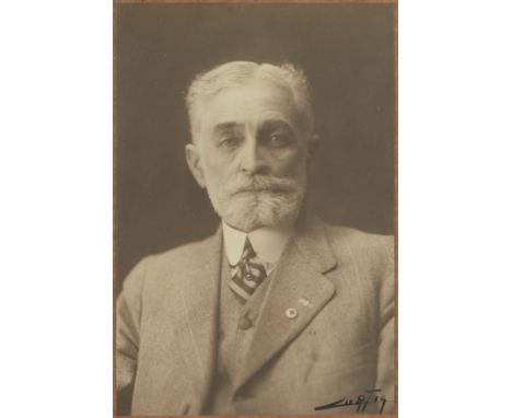 Edward Curtis (American, 1868-1952). Portrait photograph of a gentleman, silver gelatin print. Signed "Curtis" along the lowe