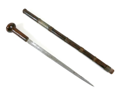 A 19th century Polynesian sword stick, with wire bound grips, blade 44cm long, 74cm long overall. 