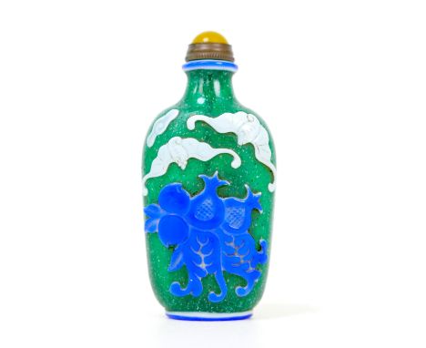 A Chinese glass scent bottle, flashed blue and white, decorated with bats and pomegranates, green and white flecked body, eng