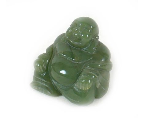 A Chinese carved jade Buddha, 4.5cm high. 