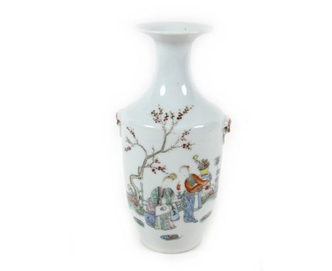 A Chinese Republic porcelain vase, of shouldered baluster form with flared rim and moulded handles, decorated in enamels with