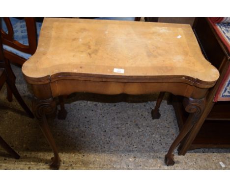 WALNUT FOLDING CARD TABLE, RAISED ON BALL AND CLAW FEET, WITH CROSS BANDED DECORATION, WIDTH APPROX 76CM