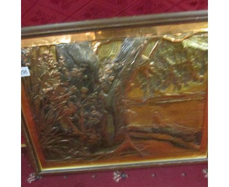 A framed picture in copper initialled M K