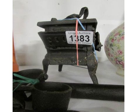 A minaiture cast iron stove (salesman's item)