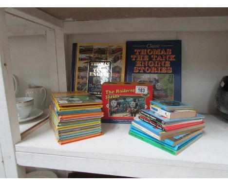 A quantity of Thomas the Tank Engine books including boxed The Railway series set and Ladybird