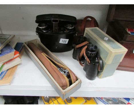 A Zeiss Nettar camera, German binoculars in metal case, Telstar binoculars and a tripod