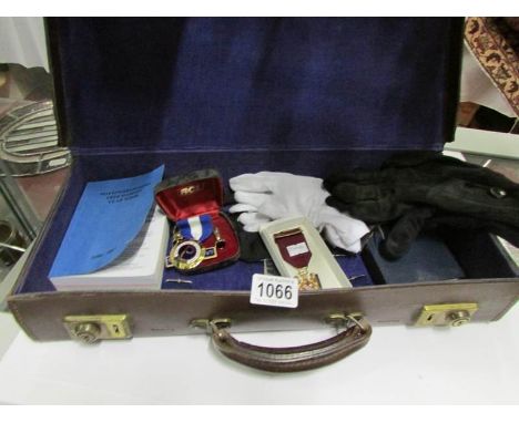 A Mason's case containing gloves, manuals, sash, jewels etc