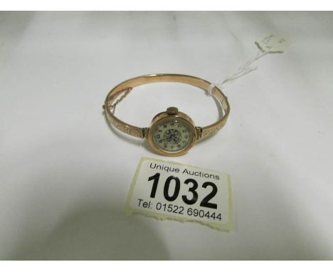 A ladies bangle watch, HM 9ct gold, London 1924
