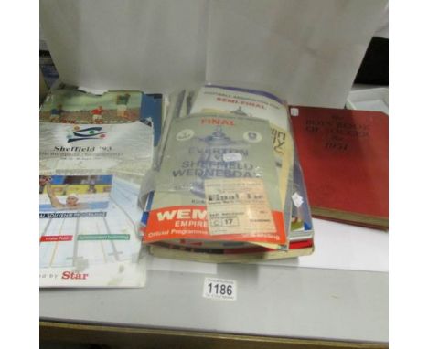 A quantity of football programmes and books including signed and 1966 FA cup final ticket