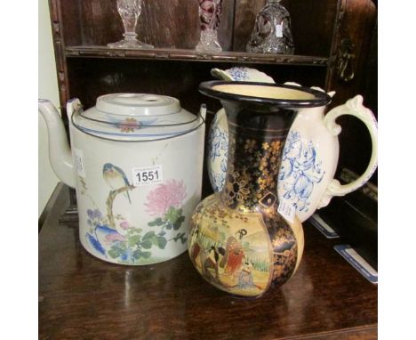 An Oriental pottery teapot, toilet jug and an early Chinese vase, a/f