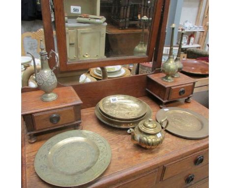 A mixed lot of Middle Eastern brass plates, dishes, teapot etc